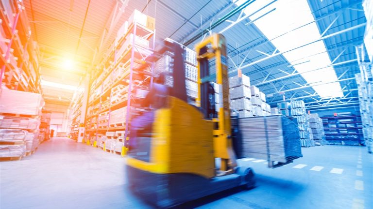 Forklift operating in a storage yard